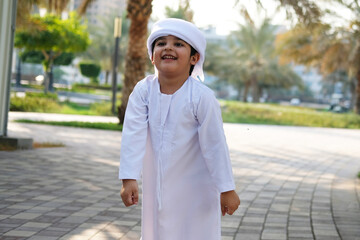 Portrait Of Young Boy Wearing Kandura For Kids Handsome Emirati Child Abu  dhabi Wall Mural | Abu dha-Nordic Studio