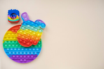 Pop it fidget toys with copy space. Children's antistress toys. Top view