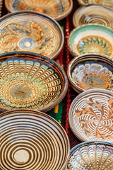 clay plates  on an empty table