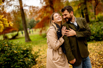 Young couple in the autumn park