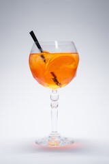 aperol spritz cocktail drink with orange and ice in glass on white background