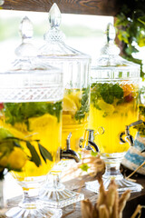 Big jar with lemonade. The concept summer relax and picnic. Healthy Food and Drink.