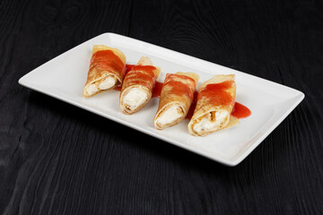 Pancakes stuffed with cream