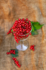red currants on wooden background