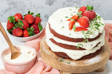 Red velvet cake on wood board. Strawbwrry cake. Devils cake. Wedding dessert. Birthday party. Delicious dessert. Traditional american dessert.