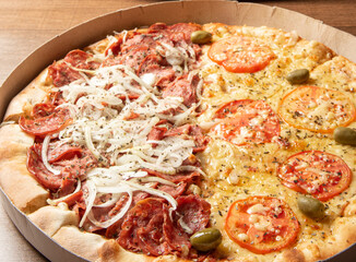 Pizza, pizza delivery inside the cardboard box used for delivery on a table, selective focus