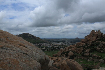 Fototapeta na wymiar chitradurga fort from hill top Cloud over the mountains Tourist attractions 