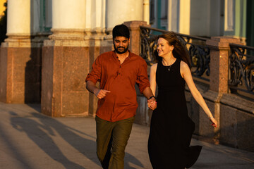 love story of young hindu guy and european beautiful girl at dawn