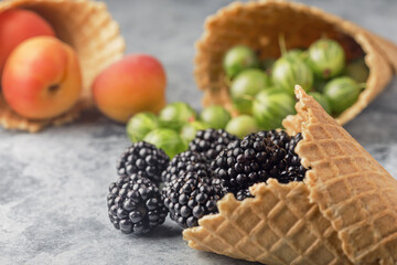 background of berries, gooseberries, mulberries and apricots
