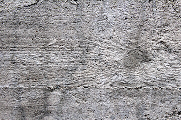 Concrete wall background with defects