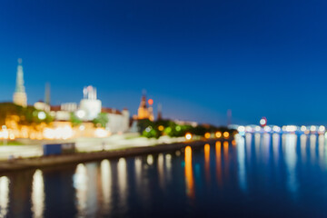 Riga, Latvia. Night Abstract Boke Bokeh Background Effect. Design Backdrop. Dome Cathedral In Evening