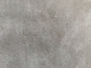 Concrete surface texture close up. Detailed pattern on a precast concrete wall. Perfect background for creative projects. Copy space, minimal photo. 