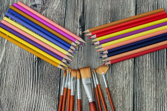 colored pencils and brushes for drawind school work creative
