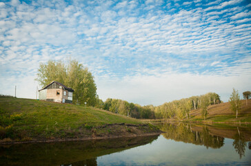 Fototapeta na wymiar landscape with a lake and a house