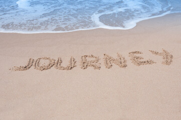 Journey Inscription  on a sandy sea coast