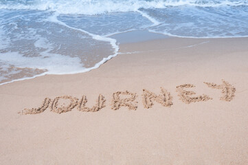 Journey Inscription  on a sandy sea coast