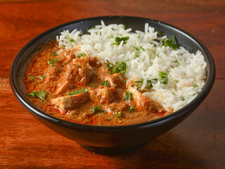 Steamed basmati rice flavoured with Cumin and spices served with a curry made of Cottage cheese...