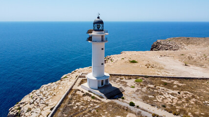 Aerial view of the lighthouse of Cape Barbaria, southwest of Formentera in the Balearic Islands,...