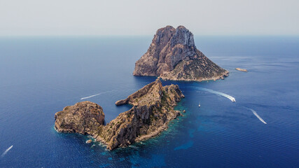 Es Vedra, a legendary rocky pyramidal islet west of Ibiza in the Balearic Islands, Spain - Mythical...