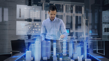 Professional Architect works with Holographic Augmented Reality 3D City Model using gestures....