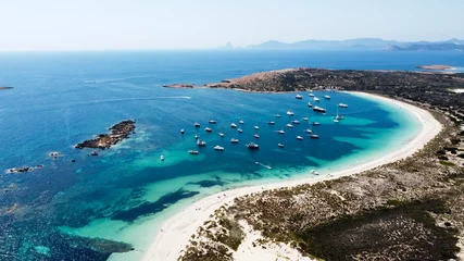 Sierkussen Aerial view of the beaches of Ses Illetes on the island of Formentera in the Balearic Islands, Spain - Turquoise waters on both sides of a sand strip in the Mediterranean Sea © Alexandre ROSA