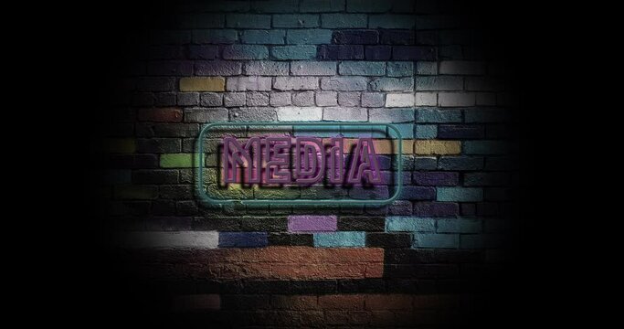 A beautiful flashing neon sign MEDIA on a multi-colored brick wall.Camera flyby, 4k texture