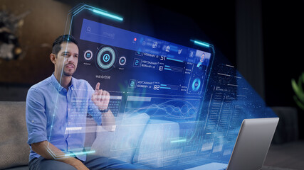 A man accesses his personal online banking platform on a futuristic holographic display using his fingers to touch a virtual display. Concept: Future and Technology