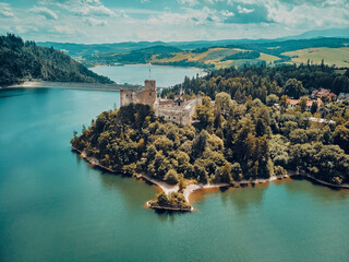 Beautiful aerial panoramic view of Niedzica Castle also known as Dunajec Castle and Lake Czorsztyn (Polish: Jezioro Czorsztynskie) is a man-made reservoir on the Dunajec river, southern Poland © udmurd