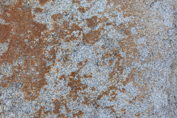 Texture of gray granite with red spots. Abstract stone background