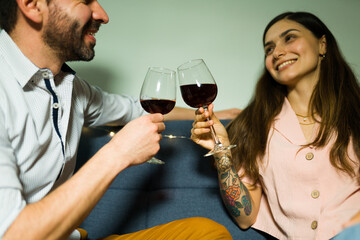 Cheers! Good-looking couple celebrating