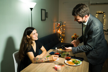 Handsome boyfriend organizing a fancy date