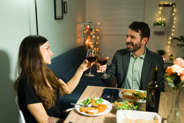 Cheers! Couple celebrating their anniversary