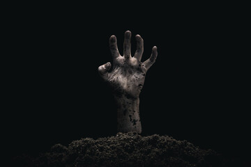 Halloween concept, zombie hand coming out from the grave. Atmosphere of horror. - 447961761