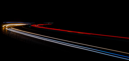 night highway, long exposure of cars lights on the night road