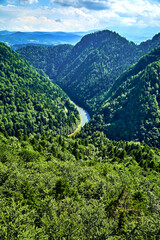 Beautiful aerial panoramic view of the Pieniny National Park, Poland in sunny day from Sokolica and Trzy Korony - English: Three Crowns (the summit of the Three Crowns Massif) on on the Dunajec river