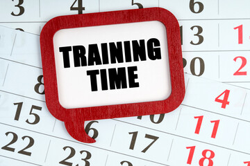 On the calendar, a red plaque with the words inside - TRAINING TIME