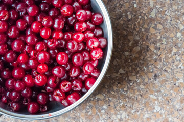 Background of fresh ripe pitted cherries