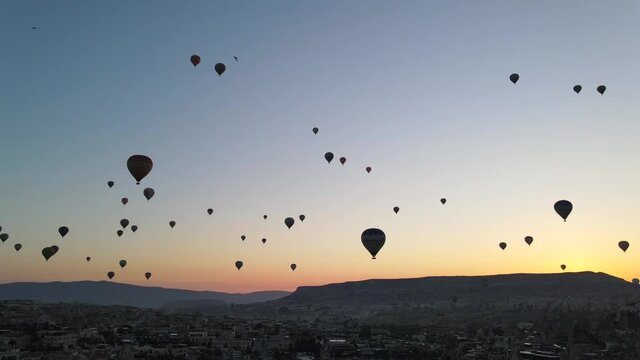 
Many beautiful balloons at sunrise in Cappadocia
