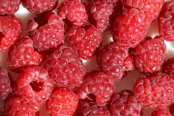 Surface of red large berries fresh, juicy raspberry, close-up