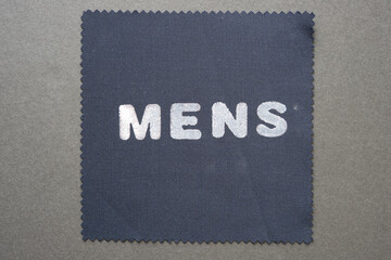formal fabric swatch with the word 