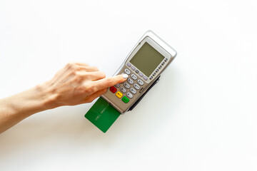 Hand paying by card with pos payment terminal. Payment transactions concept