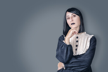 Witch as a student on a dark background for Halloween