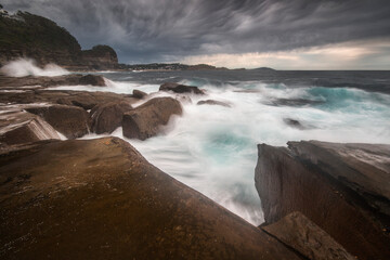 rough water conditions in the ocean along the coastline