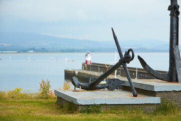 Old naval fortifications and cannons with rusty anchor as landmark and tourist attraction in...