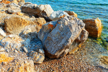 Seaside rocks . Big stones on the sea shore