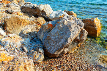 Seaside rocks . Big stones on the sea shore