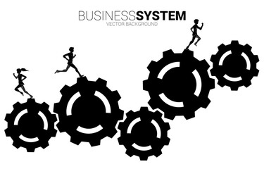 Silhouette of businessman and businesswoman running on big gear. concept of business management and teamwork.