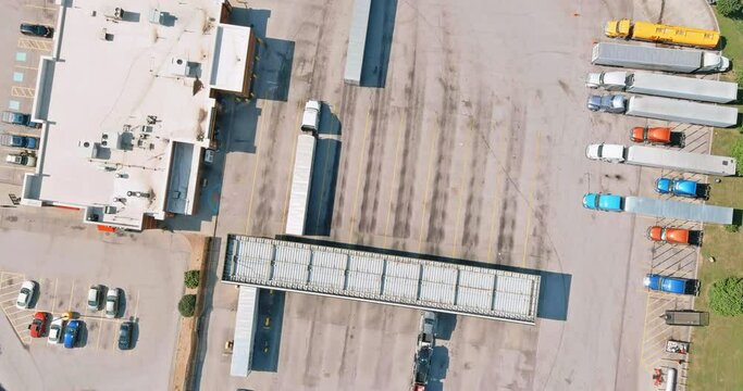 05 JULY STRAFFORD MISSOURY USA Top aerial view car parking for heavy trucks stop on rest area in the highway trucks stand in a row