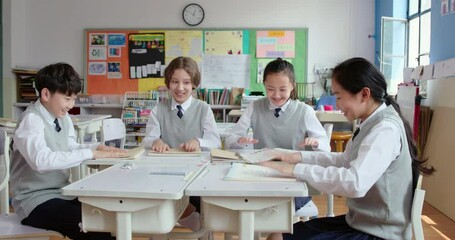 Classmates having fun in classroom,4K