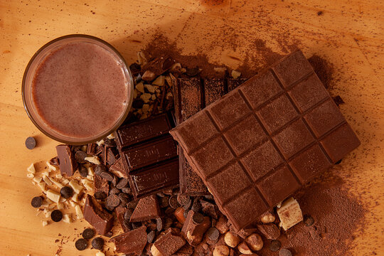 Top view of chocolate milkshake accompanied by a chocolate mix